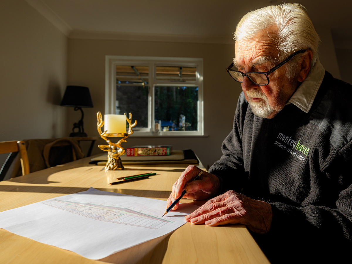 Don drawing plans of the new enclosure